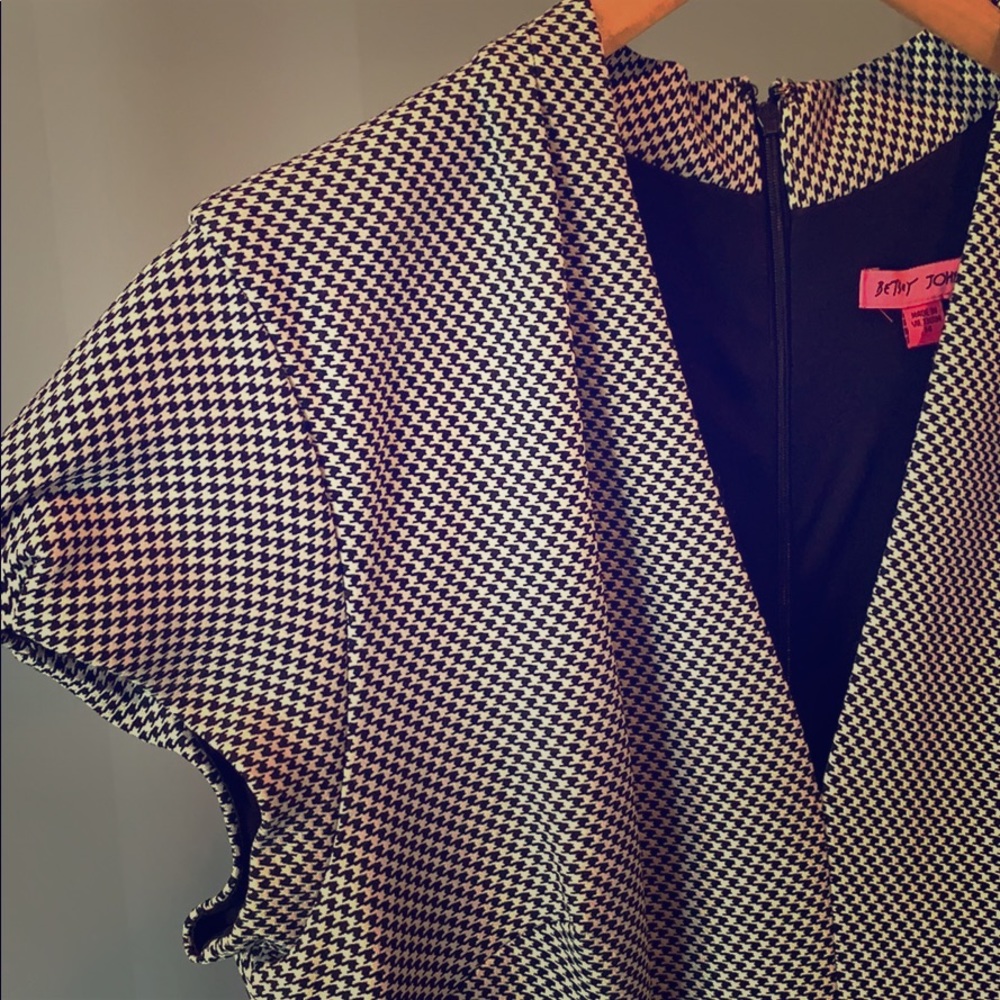 Black and white houndstooth midi length dress